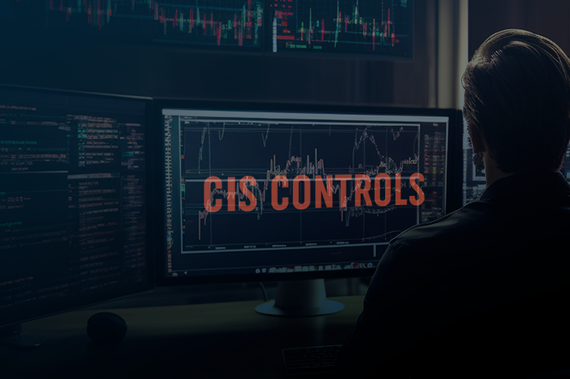 Imagem de um homem em frente a um computador com o texto Cis Controls na tela